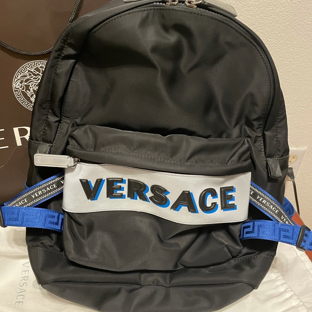 Versace backpack with leather accents like new retail price 1225$